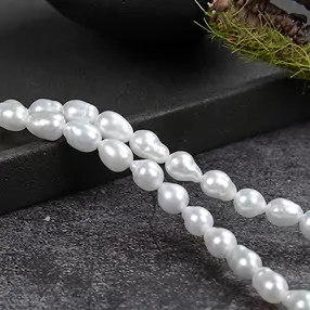 Cordón gota, perla de agua dulce, blanco-crema, 06 - 07mm | Marco Schreier