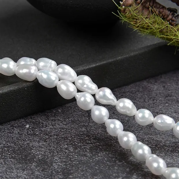 Rang de colliers goutte, perle d'eau douce, blanc-crème, 06 - 07mm | Marco Schreier