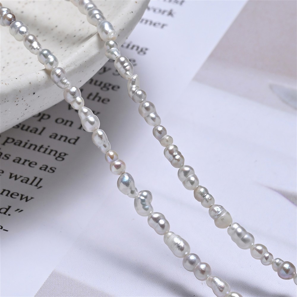 Collar Keshi, perla de agua dulce, gris-plata, 04 x 02,5-03mm (39cm)  | Marco Schreier