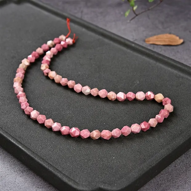 Strang Kugeln, Thulit, facettiert, 06mm (39cm) | Marco Schreier