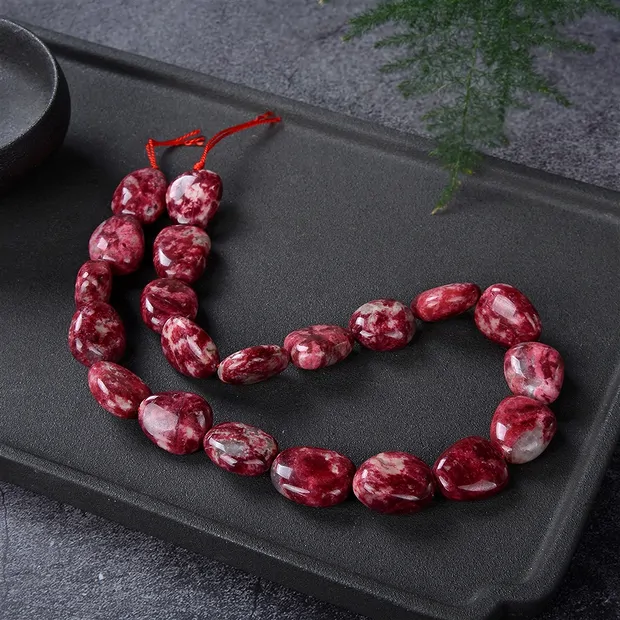 Strang Nuggets, Thulit, 18 x 14mm (39cm) | GH Edelsteine, Heilsteine & Schmuck