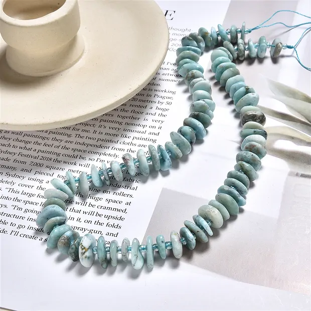 Filo di pepite piatte, Larimar, 02,5-04 x 08-12 mm | Marco Schreier