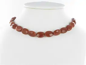 Strand Lense, Gold stone brown (synt. Glass), faceted, 14 x 10mm | Marco Schreier