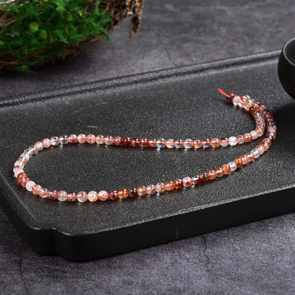 Rang de colliers boules, Quartz avec hématite, 04mm (39cm) | Marco Schreier