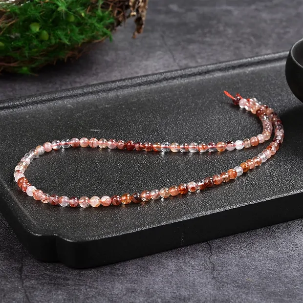 Rang de colliers boules, Quartz avec hématite, 04mm (39cm) | Marco Schreier
