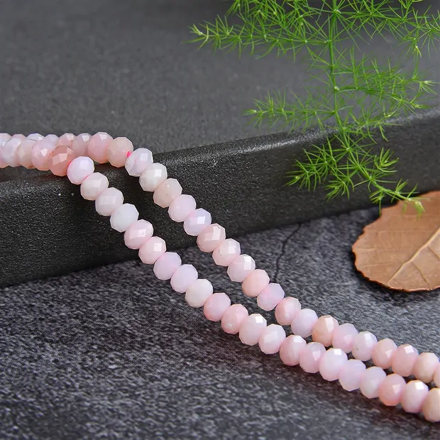 Strang Button, Andenopal (pink), facettiert, 02 x 04mm | Marco Schreier