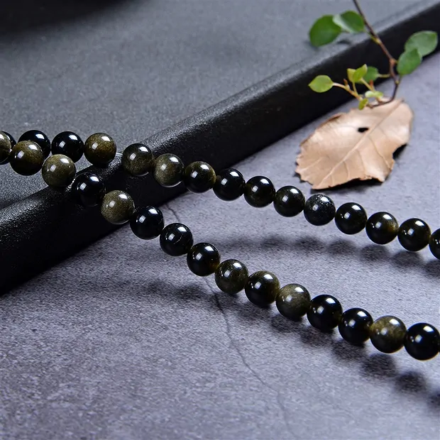 String Beads, Obsidian (gold luster obsidian), 08mm (37cm) | Marco Schreier