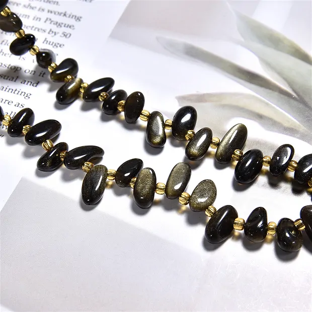 Strand of nuggets "tooth", Obsidian (gold luster obsidian), 10-20mm (39cm) | Marco Schreier