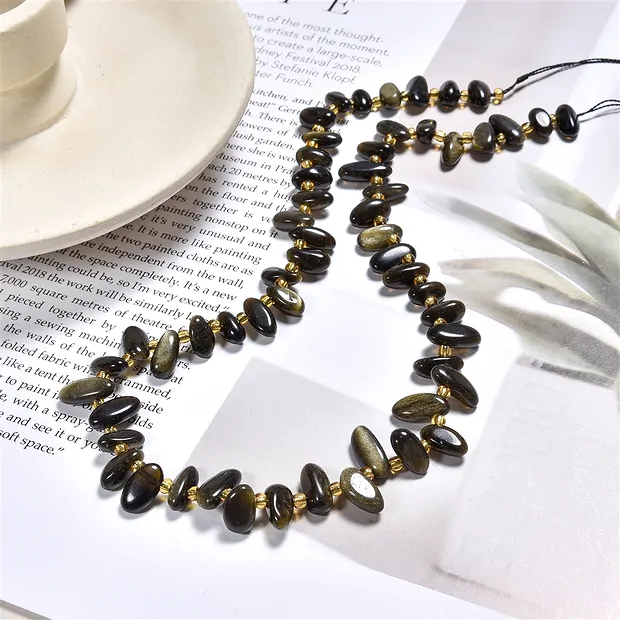 Strand of nuggets "tooth", Obsidian (gold luster obsidian), 10-20mm (39cm) | Marco Schreier