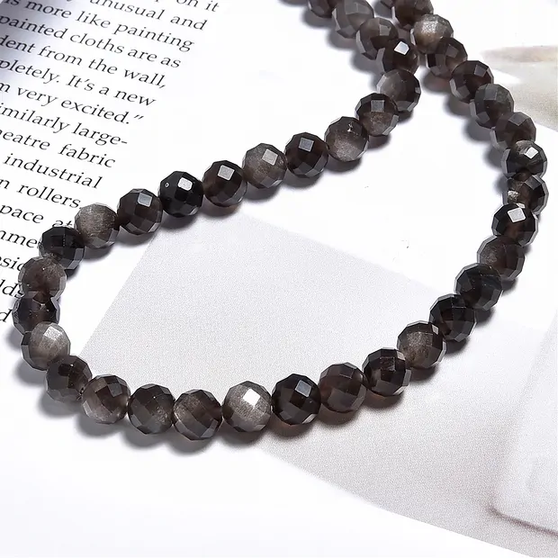String Beads, Obsidian (silver luster obsidian), 08mm, faceted | Marco Schreier