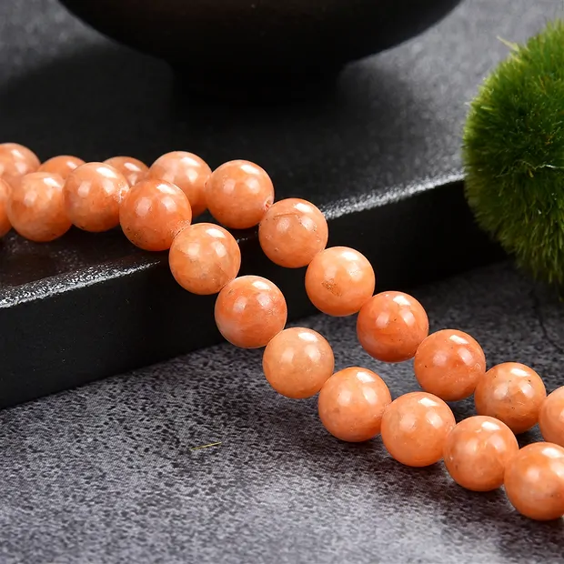 Rang de collier boules, Calcite (rouge-orange), 08mm (39cm) | Marco Schreier
