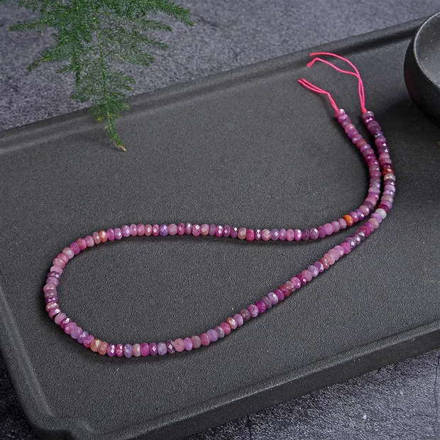 Button strand, rubellite A, faceted, 02 x 03mm (39cm) | Marco Schreier