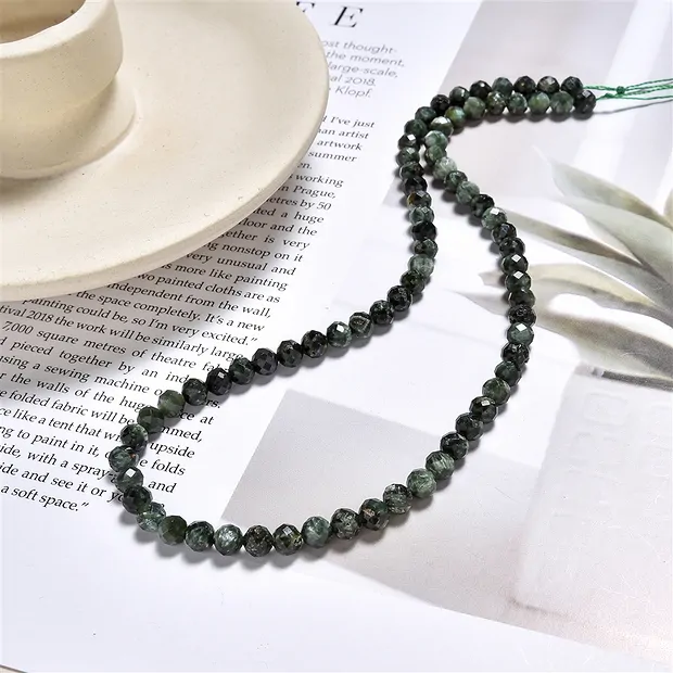 String Beads, Seraphinite, faceted, 05,8mm (39cm) | Marco Schreier