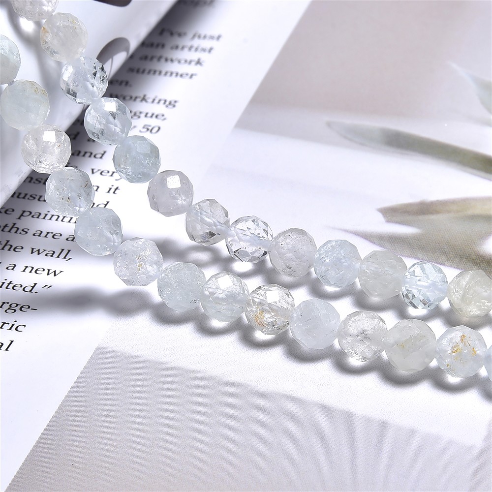 String Beads, Topaz (white-blue), faceted, 06mm (39cm) | Marco Schreier