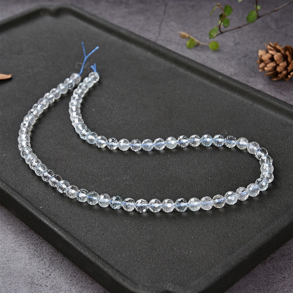 String Beads, Topaz (white-blue), faceted, 06mm (39cm) | Marco Schreier