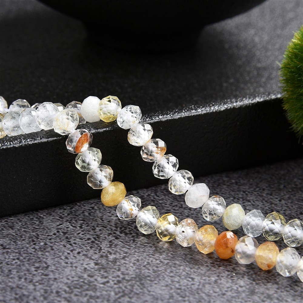 Collar de botones, topacio (de color), 03 x 05mm, facetado (39cm) | Marco Schreier