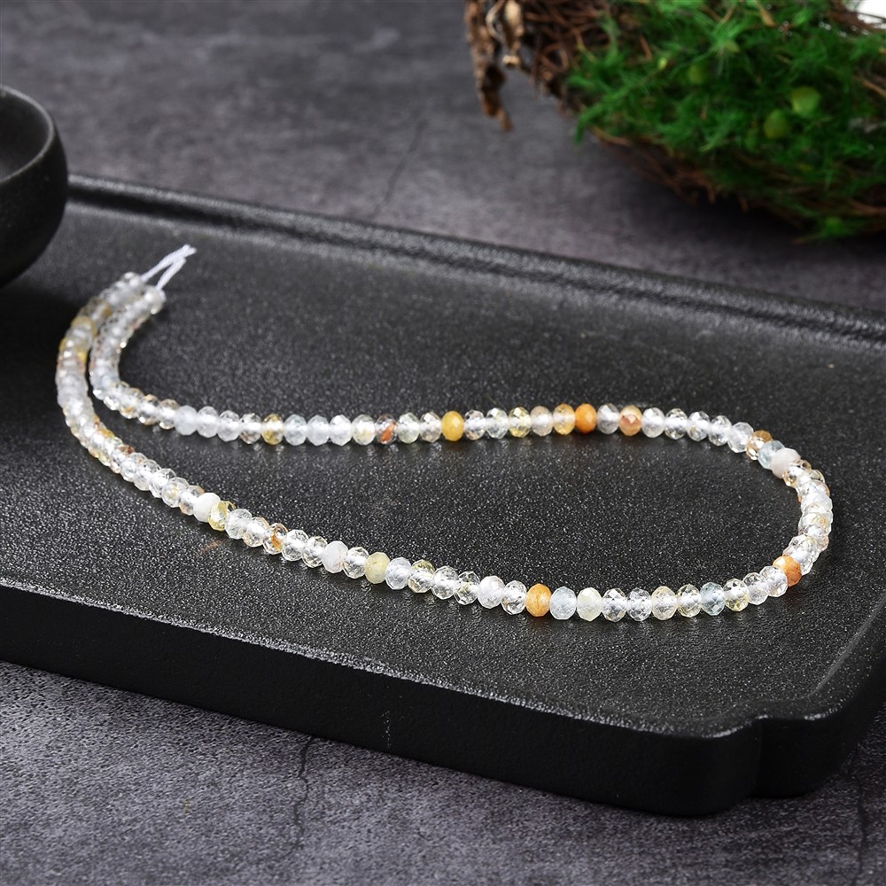 Collar de botones, topacio (de color), 03 x 05mm, facetado (39cm) | Marco Schreier