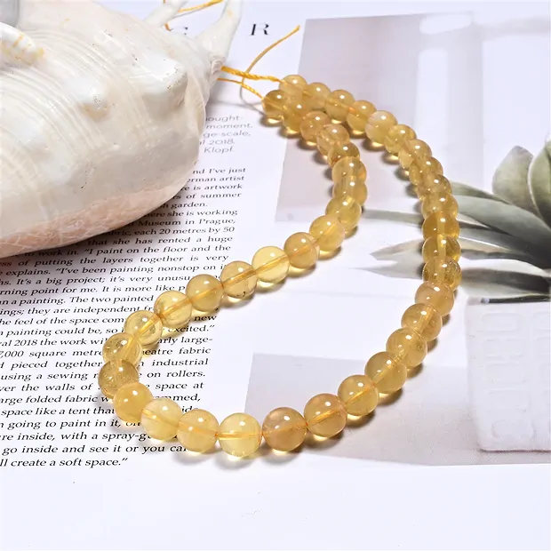 Filo di perline, Fluorite (gialla), 10 mm | grossista gemme e pietre curative