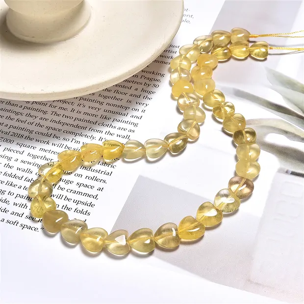Strang Herzen, Fluorit (gelb), 10mm (39cm) | GH Edelsteine, Heilsteine & Schmuck