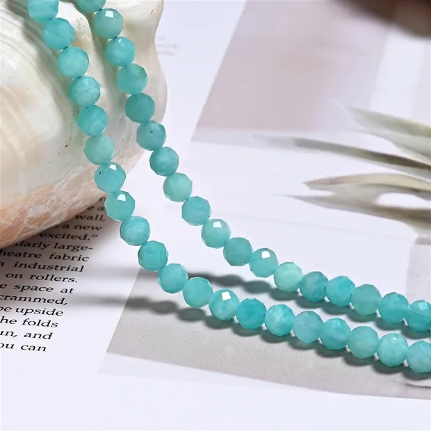 String Beads, Amazonite (light), faceted, 06mm (39cm) | Marco Schreier