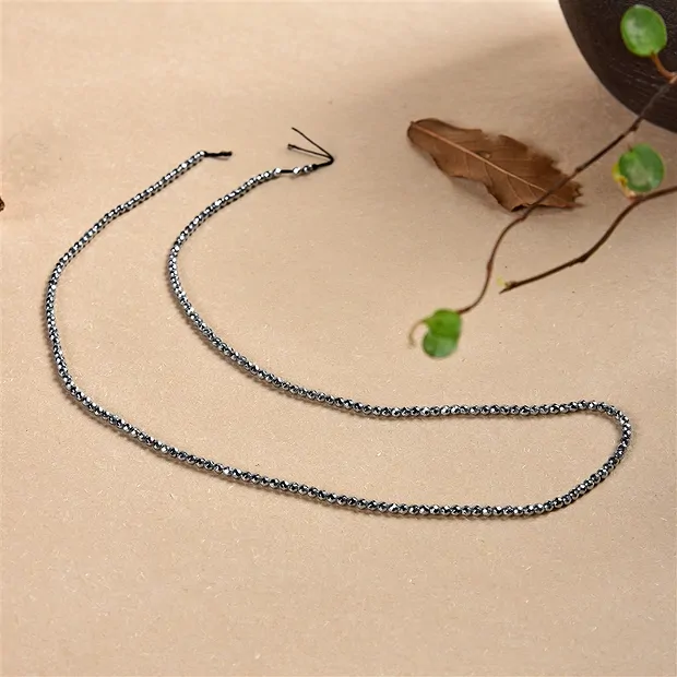String Beads, Hematine silver (dyed), faceted, 02mm | Marco Schreier