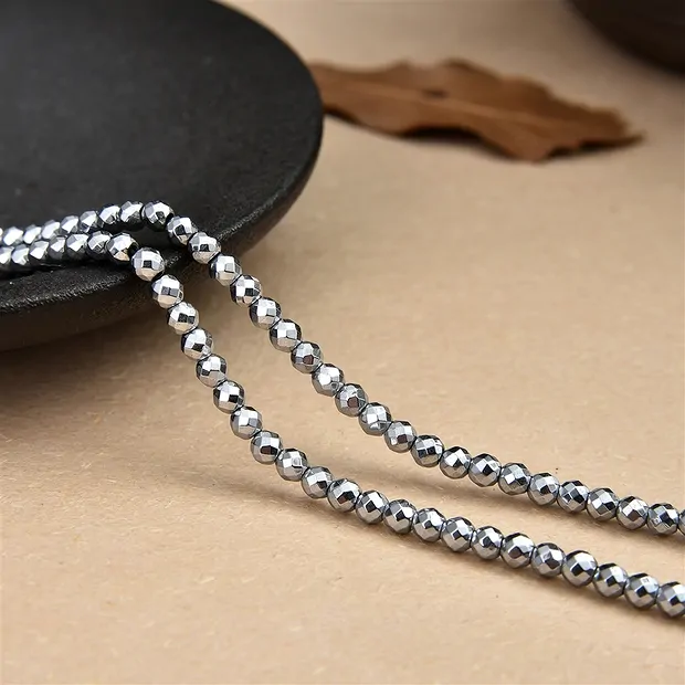 Rang de collier boules, hématite argentée (teintée), à facettes, 03mm | Marco Schreier