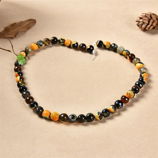 Rang de colliers boules, Agate (Sunset) orange (teintée), à facettes, 08mm | Marco Schreier