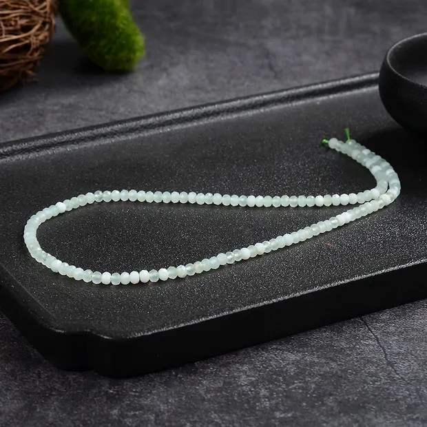 Filo di bottoni, crisopale, sfaccettato, 03 x 04 mm (39 cm) | Marco Schreier