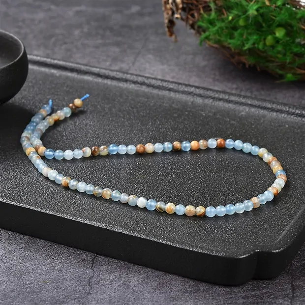 Cuentas de piedras preciosas, aragonito (azul), 04mm (39cm) | Marco Schreier