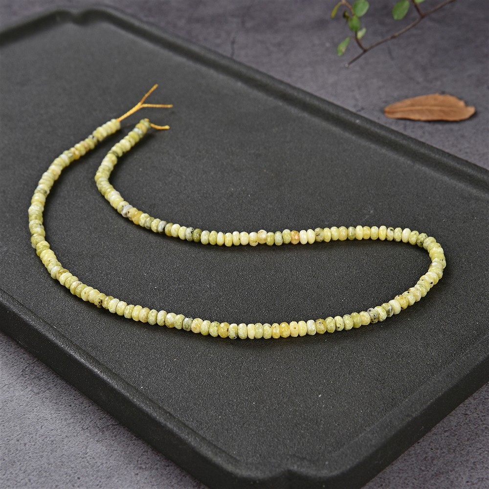 Strang Button, Serpentin (Lizardit), facettiert, 02 x 04mm | Marco Schreier