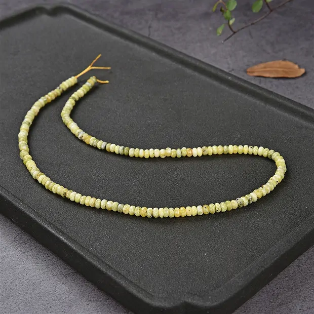 Rang de colliers Boutons, Serpentine (Lizardite), facettes, 02 x 04mm | Marco Schreier