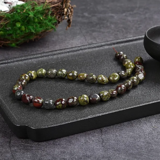 Strand of nuggets, dragon stone (Epidote quartzite), 08-10 x 10-12mm (39cm) | Marco Schreier