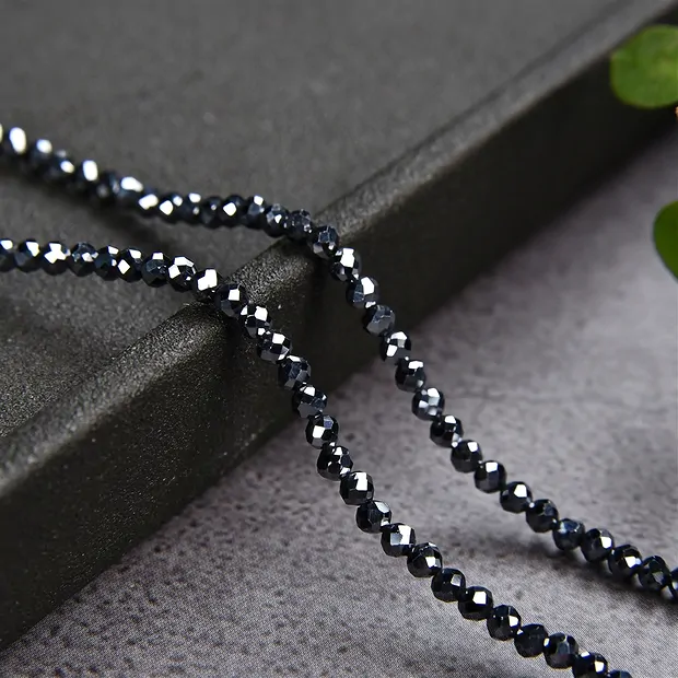 Filo di perline, silicio (sintetico), sfaccettato, 02,5 mm | Marco Schreier