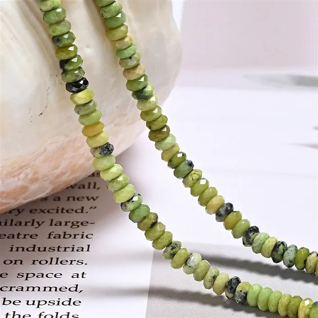 Filo di bottoni, serpentino (lizardite), 02 x 04 mm, sfaccettato (39 cm) | Marco Schreier