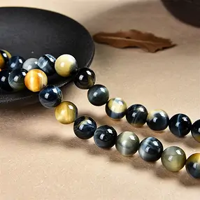Rang de collier boules, Oeil-de-tigre (blanc, jaune, bleu), 10mm (39cm) | Marco Schreier