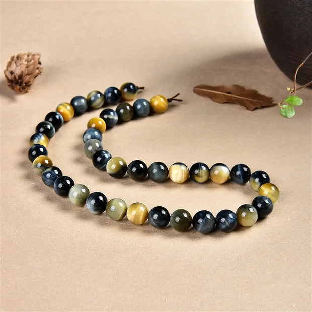 Rang de collier boules, Oeil-de-tigre (blanc, jaune, bleu), 10mm (39cm) | Marco Schreier