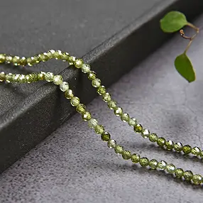 Rang de colliers boules, Zircon cubique vert (synt.), facetté, 03mm (38cm) | Marco Schreier