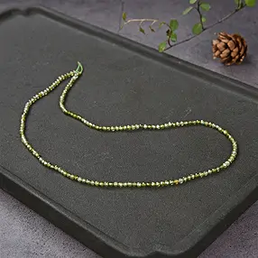 Rang de colliers boules, Zircon cubique vert (synt.), facetté, 03mm (38cm) | Marco Schreier