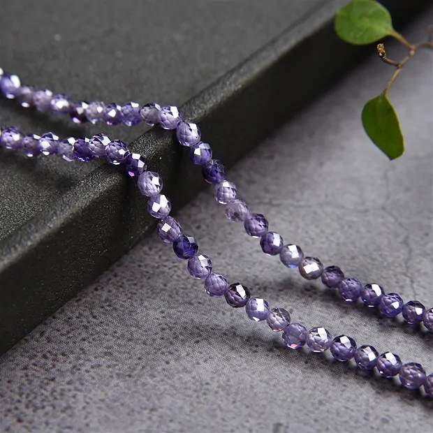 Rang de collier boules, Zircon cubique violet (synt.), facetté, 03mm (38cm) | Marco Schreier