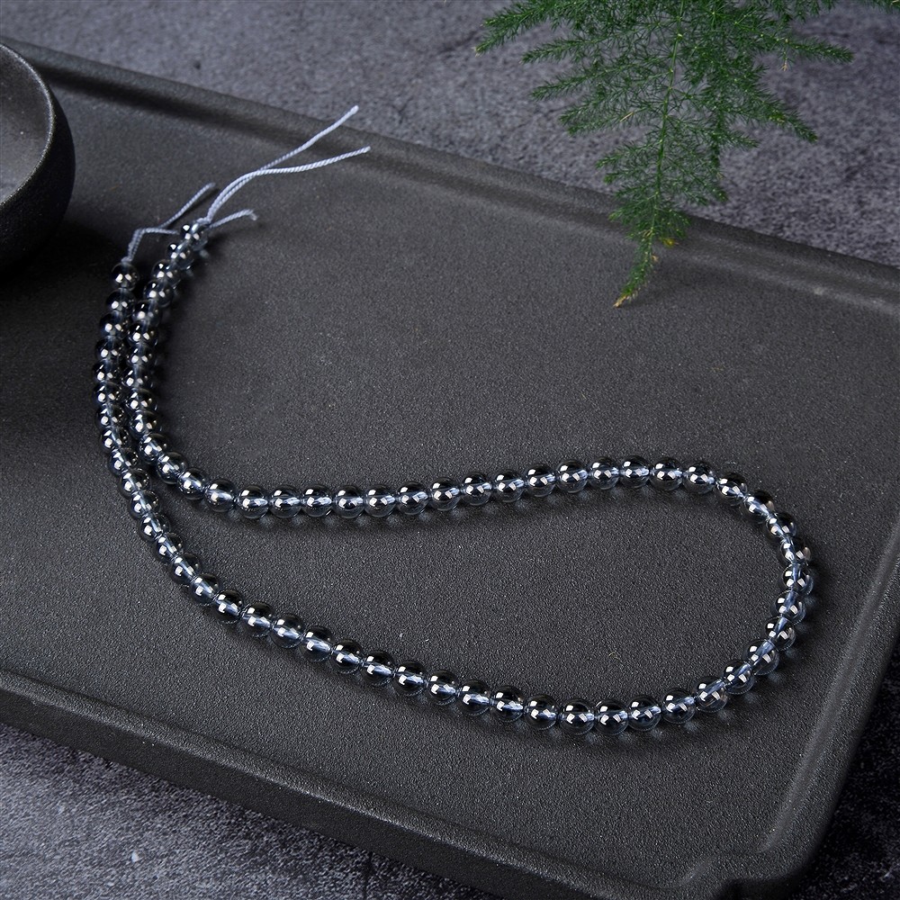 Cuentas de piedras preciosas, cuarzo aura plateado, 06mm | Marco Schreier