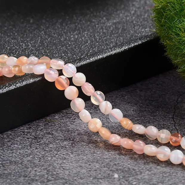 Rang de colliers, Agate (Botswana Agate orange), 04 x 02mm, facetté (39cm) | Marco Schreier