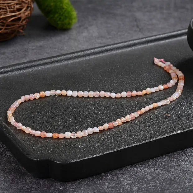 Rang de colliers, Agate (Botswana Agate orange), 04 x 02mm, facetté (39cm) | Marco Schreier