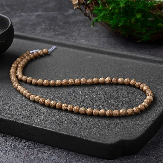 Strang Kugeln, Aragonit (Eichenberg), 05mm | GH Edelsteine, Heilsteine & Schmuck