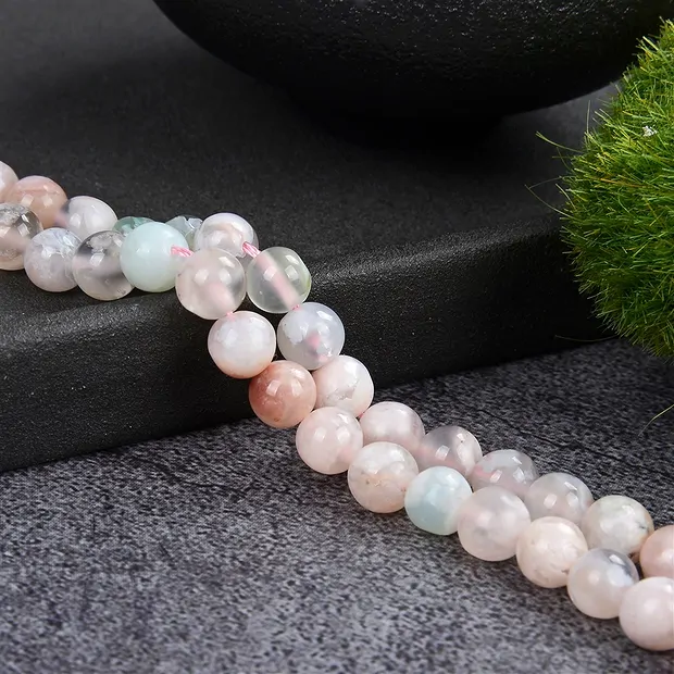 Rang de collier boules, Agate fleur de cerisier, 06mm (39cm) | Marco Schreier