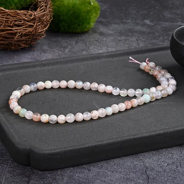 Rang de collier boules, Agate fleur de cerisier, 06mm (39cm) | Marco Schreier