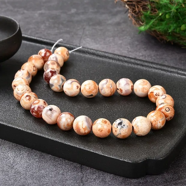 Rang de colliers boules, Agate (Agate de Mongolie claire), 14mm (39cm) | Marco Schreier