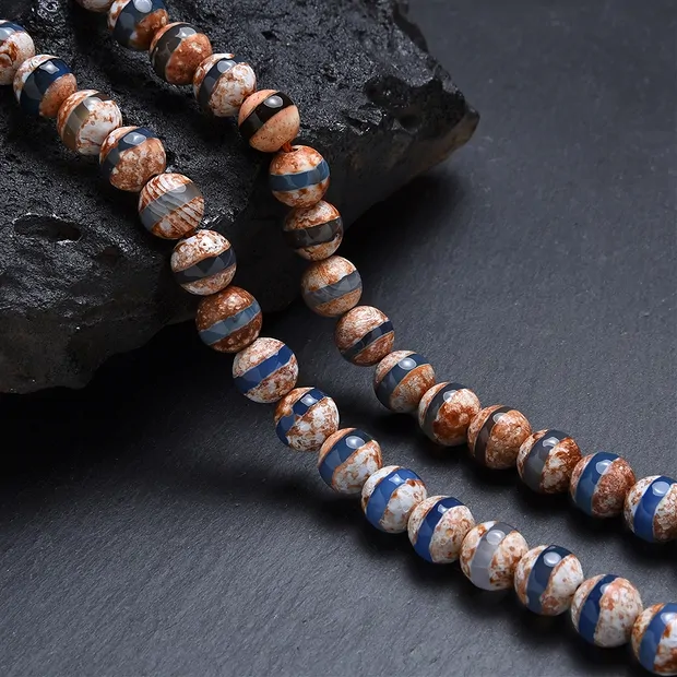 Rang de collier boules, Agate (Agate de Mongolie brun-blanc-bleu), 08mm, à facettes (36cm) | Marco Schreier