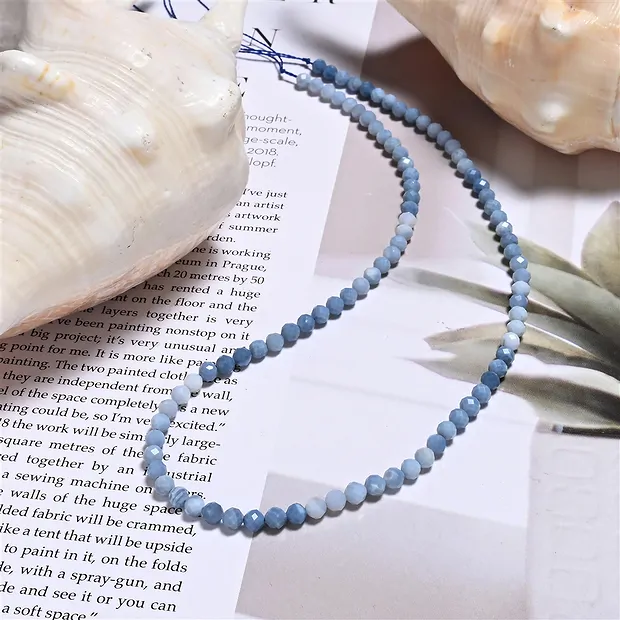 Strang Kugeln, Opal (Owyhee Opal blau), 04mm, facettiert (39cm) | Marco Schreier