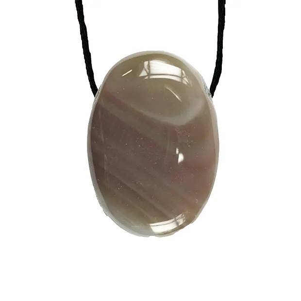 Lucky stone with ribbon on astro card Pisces/Agate | Marco Schreier