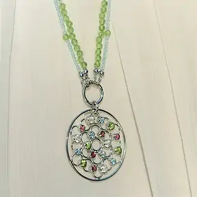 Colgante peridoto, topacio, turmalina "círculo facetado", 5,0 cm, rodinado | Marco Schreier